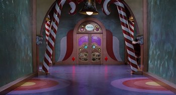 Movie still from “The Santa Clause” (1994), directed by John Pasquin – A room decorated with candy canes and a bell; Extreme Wide shot, High angle