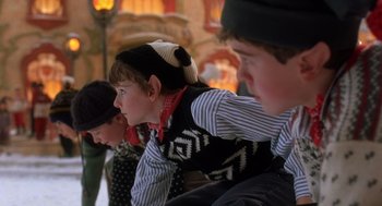 Movie still from “The Santa Clause 2” (2002), directed by Michael Lembeck – A group of young people sitting next to each other; Medium shot, Over the shoulder angle
