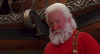 Movie still from “The Santa Clause 2” (2002), directed by Michael Lembeck – A man with a beard and a white beard; Close Up shot, Low angle
