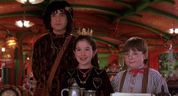 Movie still from “The Santa Clause 2” (2002), directed by Michael Lembeck – Three children dressed up in medieval clothing; Medium shot, Low angle