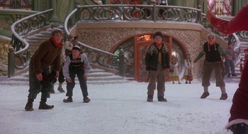 Movie still from “The Santa Clause 2” (2002), directed by Michael Lembeck – A group of children standing in the snow; Wide shot, Low angle