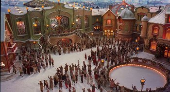 Movie still from “The Santa Clause 2” (2002), directed by Michael Lembeck – A group of people standing in front of a building; Extreme Wide shot, High angle