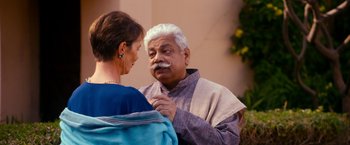 Movie still from “The Second Best Exotic Marigold Hotel” (2015), directed by John Madden – An older man and a younger woman looking at each other; Medium shot, Over the shoulder angle