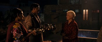Movie still from “The Second Best Exotic Marigold Hotel” (2015), directed by John Madden – A man and a woman standing next to each other; Medium shot, High angle