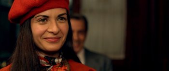 Movie still from “The Secret in Their Eyes” (2009), directed by Juan José Campanella – A person wearing a red hat; Close Up shot, Over the shoulder angle