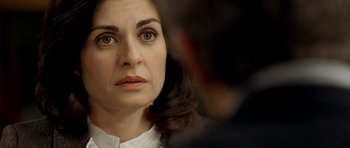 Movie still from “The Secret in Their Eyes” (2009), directed by Juan José Campanella – A woman's face as she looks into the distance; Close Up shot, Over the shoulder angle
