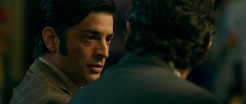 Movie still from “The Secret in Their Eyes” (2009), directed by Juan José Campanella – A person talking to another person; Close Up shot, Over the shoulder angle