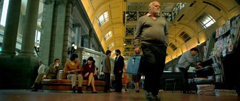 Movie still from “The Secret in Their Eyes” (2009), directed by Juan José Campanella – A group of people standing in a room; Wide shot, Low angle