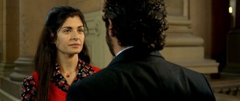 Movie still from “The Secret in Their Eyes” (2009), directed by Juan José Campanella – A man and a woman talking to each other; Close Up shot, Over the shoulder angle