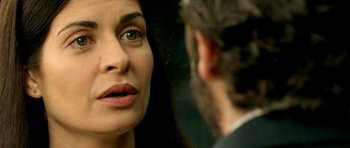 Movie still from “The Secret in Their Eyes” (2009), directed by Juan José Campanella – A woman looking at a man's face; Close Up shot, Over the shoulder angle