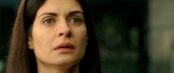 Movie still from “The Secret in Their Eyes” (2009), directed by Juan José Campanella – A woman's face with long black hair; Close Up shot, High angle