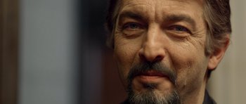 Movie still from “The Secret in Their Eyes” (2009), directed by Juan José Campanella – A person with a beard; Extreme Close Up shot, Over the shoulder angle