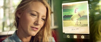 Movie still from “The Shallows” (2016), directed by Jaume Collet-Serra – A person sitting in front of a computer screen; Close Up shot, Over the shoulder angle