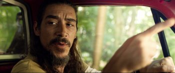 Movie still from “The Shallows” (2016), directed by Jaume Collet-Serra – A person with long hair driving a car; Close Up shot, Over the shoulder angle