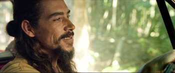 Movie still from “The Shallows” (2016), directed by Jaume Collet-Serra – A person with long hair and a beard; Close Up shot, Over the shoulder angle