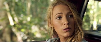 Movie still from “The Shallows” (2016), directed by Jaume Collet-Serra – A person sitting in a car; Close Up shot, Over the shoulder angle