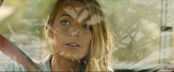 Movie still from “The Shallows” (2016), directed by Jaume Collet-Serra – A woman's face through a window; Close Up shot, Over the shoulder angle