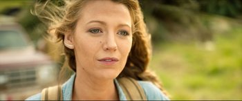 Movie still from “The Shallows” (2016), directed by Jaume Collet-Serra – A person with a backpack; Close Up shot, High angle