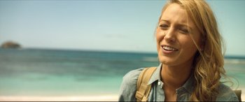 Movie still from “The Shallows” (2016), directed by Jaume Collet-Serra – A woman with a backpack standing on the beach; Close Up shot, Over the shoulder angle