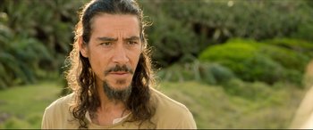 Movie still from “The Shallows” (2016), directed by Jaume Collet-Serra – A person with long hair and a beard; Close Up shot, Over the shoulder angle