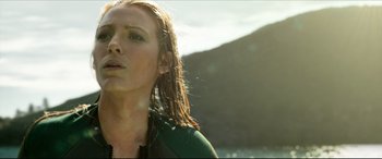 Movie still from “The Shallows” (2016), directed by Jaume Collet-Serra – A person with wet hair; Close Up shot, Low angle