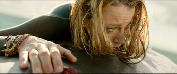 Movie still from “The Shallows” (2016), directed by Jaume Collet-Serra – A person with a knife in their hand; Close Up shot, High angle