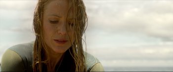 Movie still from “The Shallows” (2016), directed by Jaume Collet-Serra – A person with wet hair; Close Up shot, Low angle