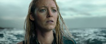 Movie still from “The Shallows” (2016), directed by Jaume Collet-Serra – A person with wet hair; Close Up shot, Low angle
