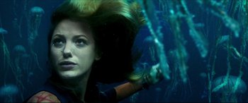 Movie still from “The Shallows” (2016), directed by Jaume Collet-Serra – A woman is swimming in the ocean under the water; Close Up shot, Low angle