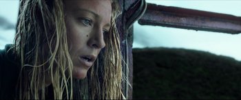 Movie still from “The Shallows” (2016), directed by Jaume Collet-Serra – A person with dreadlocks; Close Up shot, Low angle