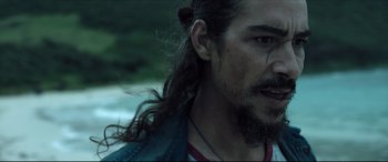 Movie still from “The Shallows” (2016), directed by Jaume Collet-Serra – A person with long hair; Close Up shot, Over the shoulder angle