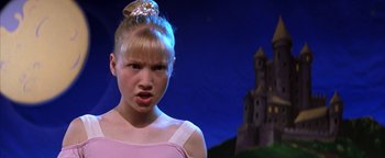 Movie still from “The Sisterhood of the Traveling Pants” (2005), directed by Ken Kwapis – A young girl in front of a castle with her mouth wide open; Close Up shot, Low angle