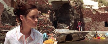 Movie still from “The Sisterhood of the Traveling Pants” (2005), directed by Ken Kwapis – A young girl standing in front of a rock wall; Close Up shot, Low angle