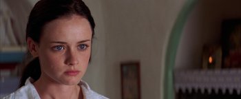 Movie still from “The Sisterhood of the Traveling Pants” (2005), directed by Ken Kwapis – A woman's face in a room; Close Up shot, Over the shoulder angle