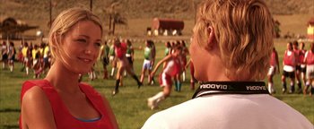 Movie still from “The Sisterhood of the Traveling Pants” (2005), directed by Ken Kwapis – A group of young people playing a game of soccer; Medium shot, Over the shoulder angle