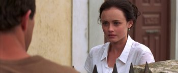 Movie still from “The Sisterhood of the Traveling Pants” (2005), directed by Ken Kwapis – A person wearing a white shirt; Close Up shot, Over the shoulder angle