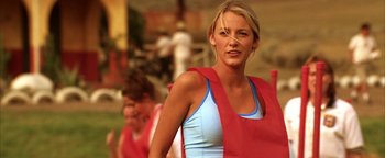 Movie still from “The Sisterhood of the Traveling Pants” (2005), directed by Ken Kwapis – A beautiful blonde woman in a blue shirt and a red shirt; Close Up shot, Low angle