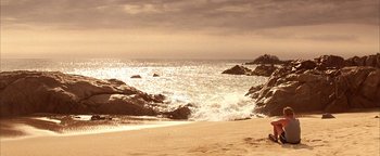 Movie still from “The Sisterhood of the Traveling Pants” (2005), directed by Ken Kwapis – A view of the ocean from the beach; Extreme Wide shot, High angle