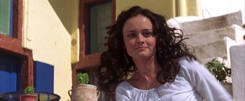 Movie still from “The Sisterhood of the Traveling Pants” (2005), directed by Ken Kwapis – A beautiful woman with long dark brown hair and blue eyes; Close Up shot, Low angle