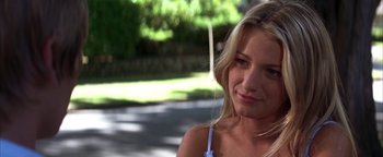 Movie still from “The Sisterhood of the Traveling Pants” (2005), directed by Ken Kwapis – A beautiful young lady standing on the side of a road; Close Up shot, Over the shoulder angle