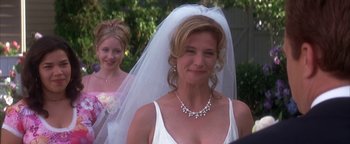 Movie still from “The Sisterhood of the Traveling Pants” (2005), directed by Ken Kwapis – A woman in a white dress with a veil on her head; Close Up shot, Over the shoulder angle