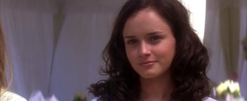 Movie still from “The Sisterhood of the Traveling Pants” (2005), directed by Ken Kwapis – A person with long hair; Close Up shot, Over the shoulder angle