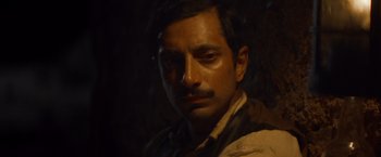 Movie still from “The Sisters Brothers” (2018), directed by Jacques Audiard – A person with a mustache; Close Up shot, High angle