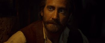 Movie still from “The Sisters Brothers” (2018), directed by Jacques Audiard – A person with a beard; Close Up shot, High angle