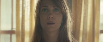 Movie still from “The Skeleton Twins” (2014), directed by Craig Johnson – A person with long hair; Close Up shot, Low angle