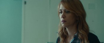 Movie still from “The Skeleton Twins” (2014), directed by Craig Johnson – A person with long red hair; Close Up shot, Over the shoulder angle