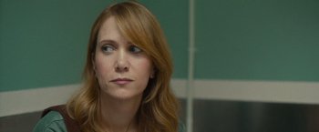 Movie still from “The Skeleton Twins” (2014), directed by Craig Johnson – A person with long red hair; Close Up shot, Over the shoulder angle