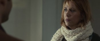 Movie still from “The Skeleton Twins” (2014), directed by Craig Johnson – A person wearing a scarf; Close Up shot, Over the shoulder angle