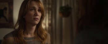 Movie still from “The Skeleton Twins” (2014), directed by Craig Johnson – A person with long red hair; Close Up shot, Over the shoulder angle