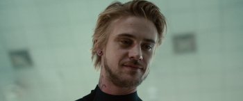 Movie still from “The Skeleton Twins” (2014), directed by Craig Johnson – A person with tattoos on their face; Close Up shot, Over the shoulder angle